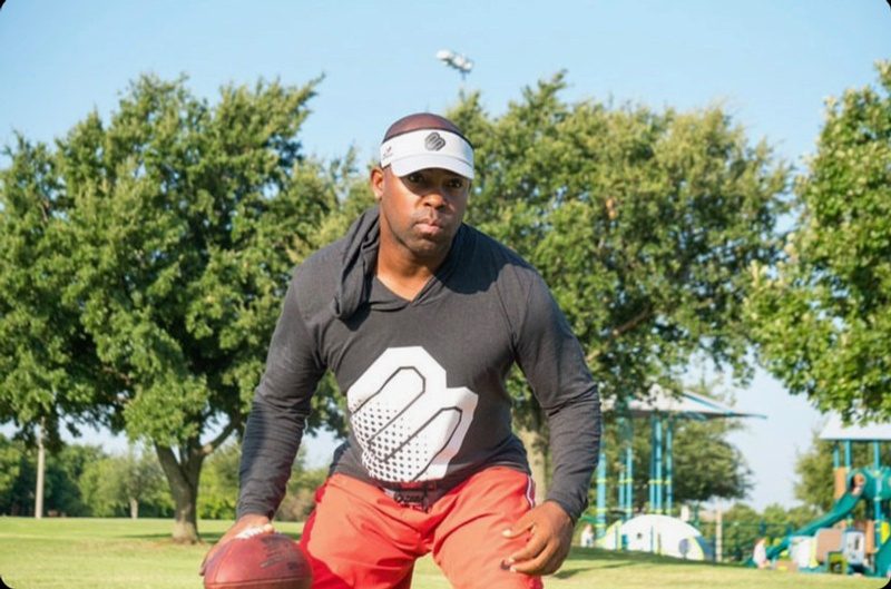 Clay Mack coaching on the field